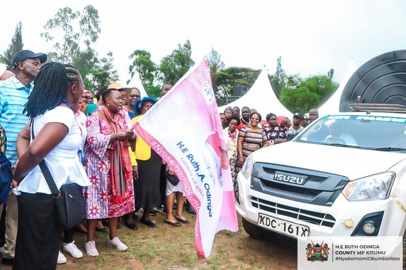 Nyakamami Foundation founder H.E Ruth Odinga flagging of the distribution of water tanks to aid in pushing the initiative on sustainable farming