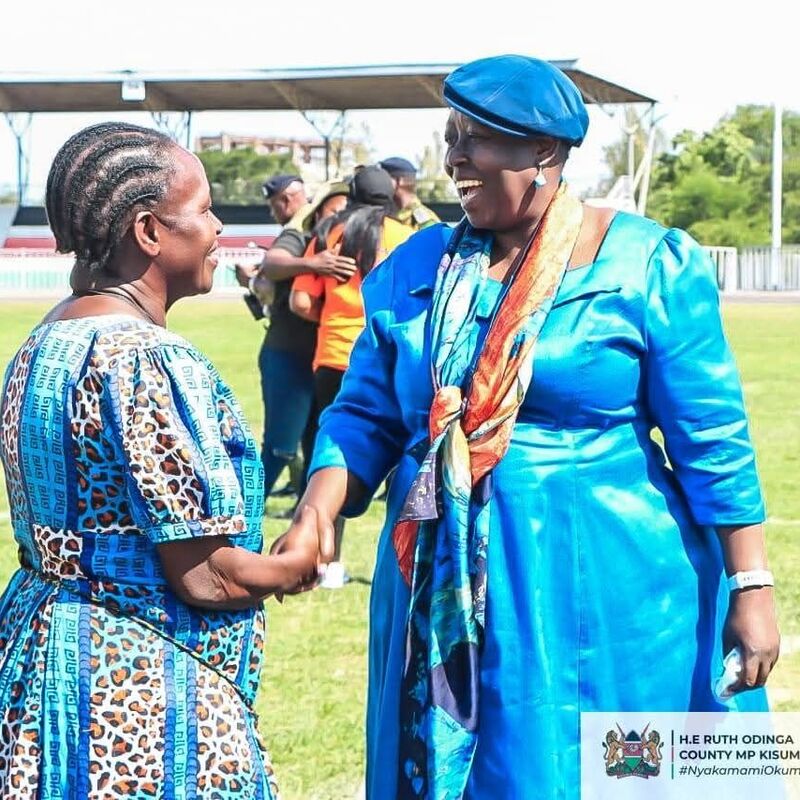 H.E Ruth Odinga with a resident of Kisumu County.
